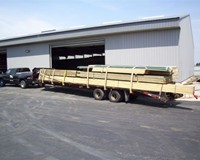 100_0128-Post frame packages delivered to site